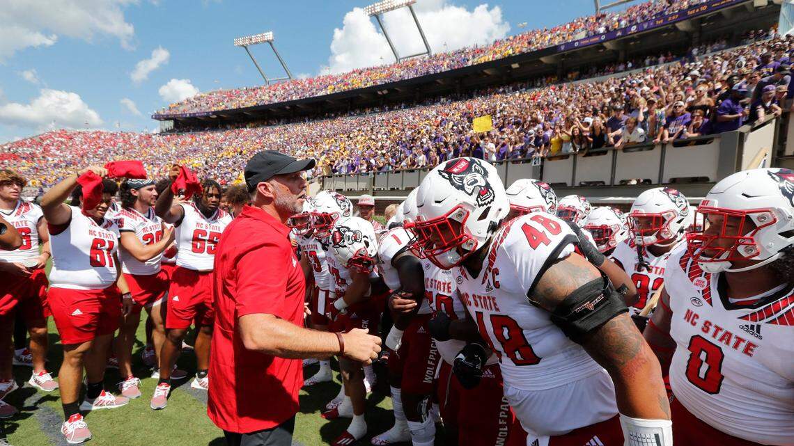 N.C. State head coach Dave Doeren prepares to lead the Wolfpack onto the field before N.C. States 21-20 victory over ECU at Dowdy-Ficklen Stadium in Greenville, N.C., Saturday, Sept. 3, 2022.