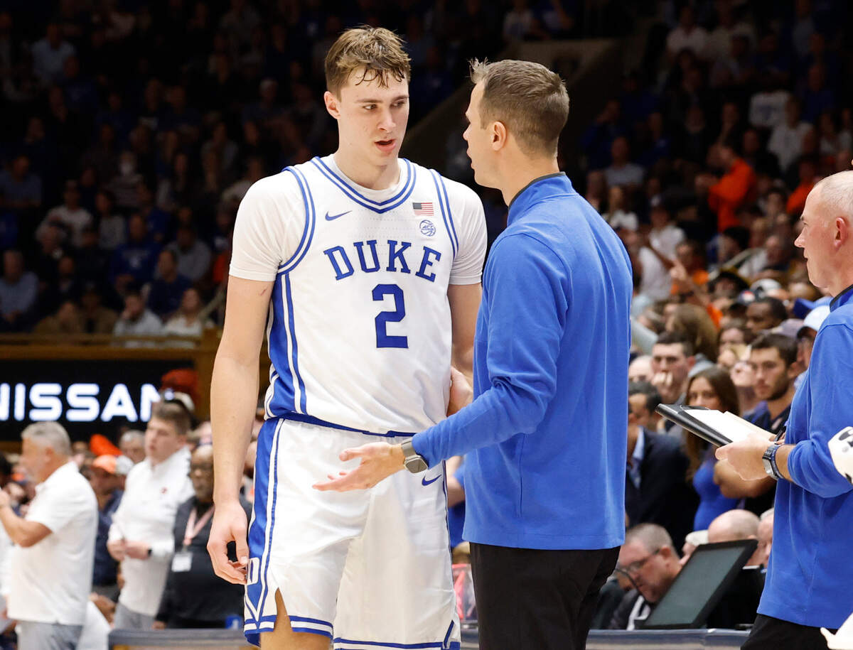 Duke head coach Jon Scheyer talks to Cooper Flagg (2) during the second half of Duke’s 84-78 victory over Auburn at Cameron Indoor Stadium in Durham, N.C., Wednesday, Dec. 4, 2024.