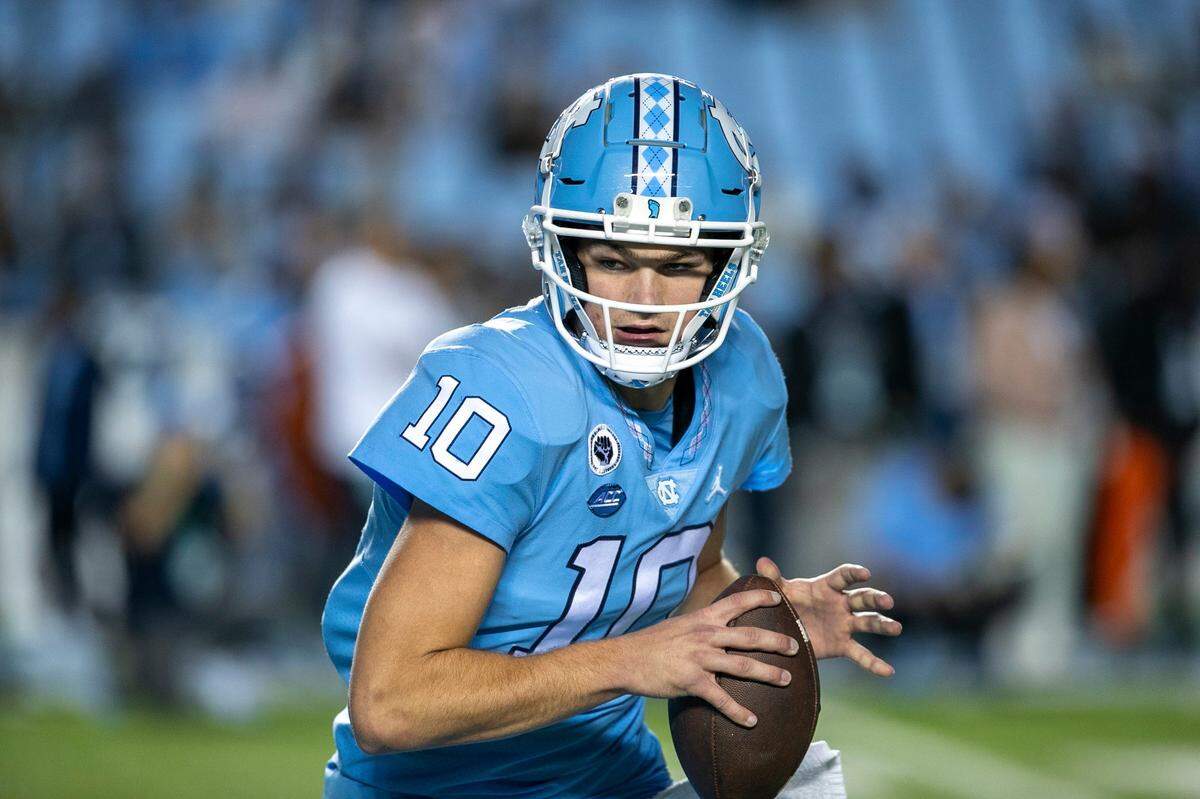 North Carolina quarterback Drake Maye (10) warms up for the Tar Heels’ game against Pitt on Saturday, October 29, 2022 at Kenan Stadium in Chapel Hill, N