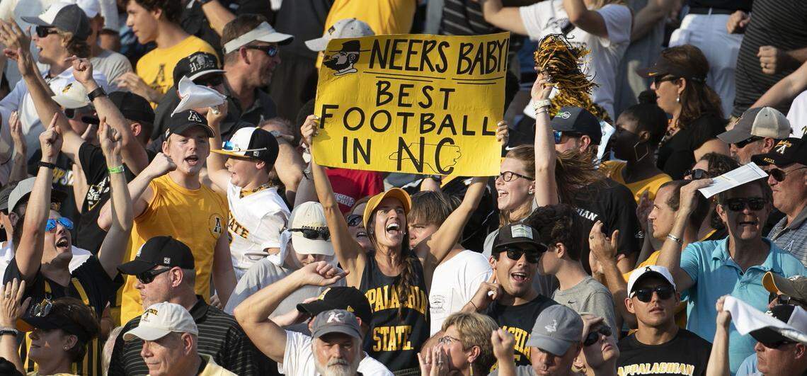 Appalachian State fans celebrate after the Mountaineers took a ten point lead over North Carolina in the third quarter on Saturday, September 21, 2019 at Kenan Stadium in Chapel Hill, N.C.