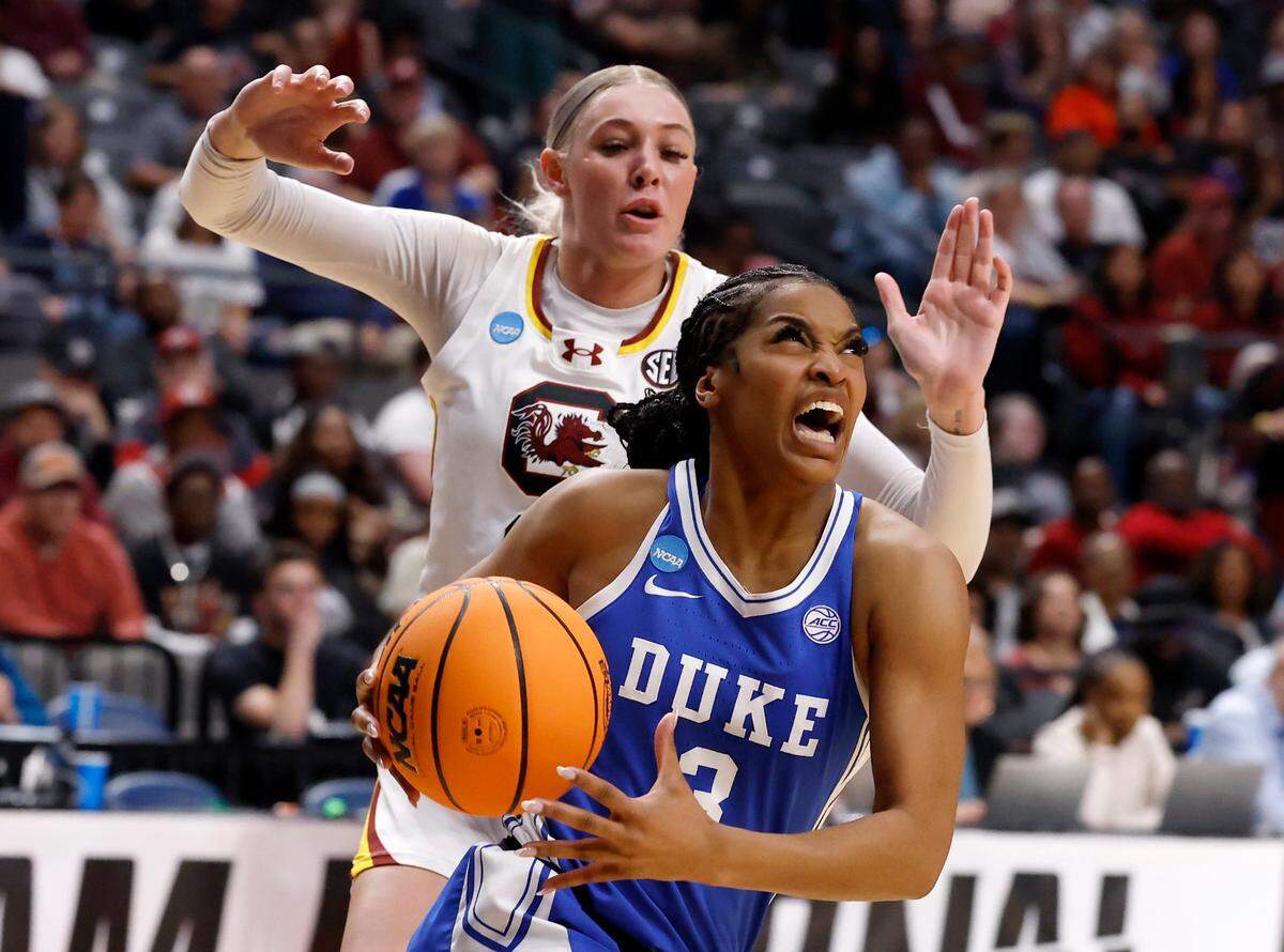 Duke’s Ashlon Jackson drives past South Carolina’s Chloe Kitts during the second half of the Blue Devils’ 54-50 loss in the NCAA Tournament Elite Eight at Legacy Arena on Sunday, March 30, 2025, in Birmingham, Ala.