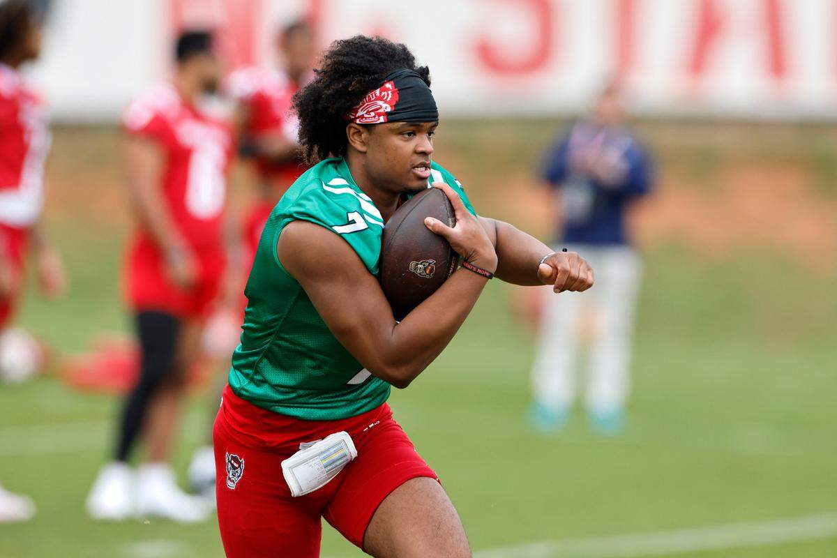 N.C. State quarterback MJ Morris (7) runs drills during the Wolfpack’s first spring practice in Raleigh, N.C., Wednesday, March 1, 2023.