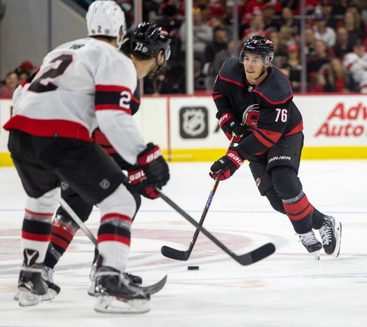 The Carolina Hurricanes Brady Skjei (76) moves the puck up the ice against the Ottawa Senators on Wednesday, October 11, 2023 at PNC Arena, in Raleigh N.C