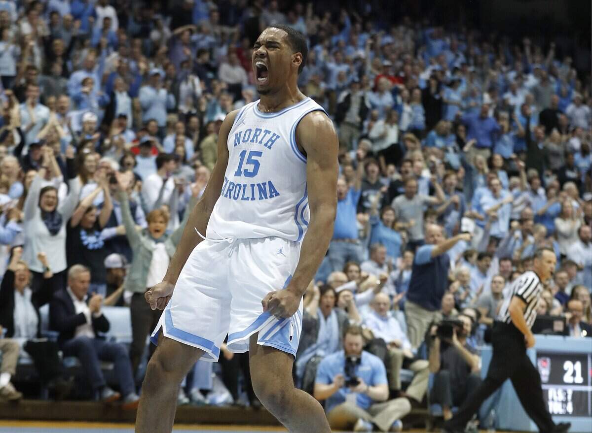 North Carolina’s Garrison Brooks (15) celebrates after slamming in two during the first half of N.C. State’s game against UNC at the Smith Center in Chapel Hill, N.C. Tuesday, Feb. 5, 2019.