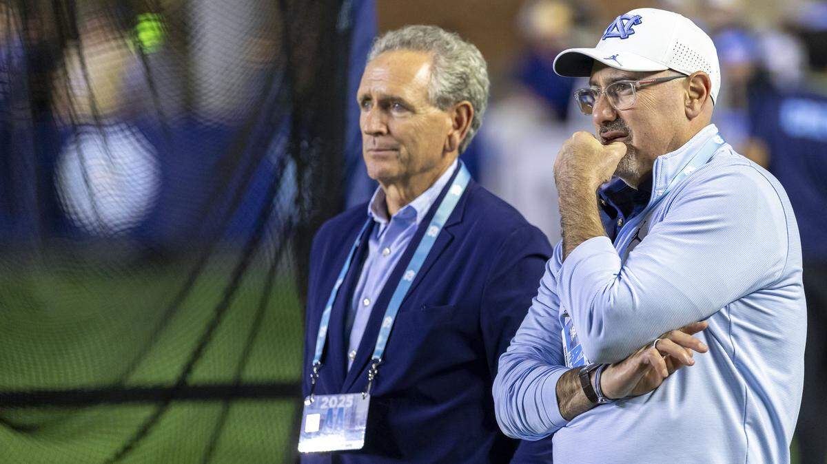 North Carolina athletic director Bubba Cunningham and associate athletic director Steve Newmark chat during the Tar Heels’ game against Stanford on Saturday, November 8, 2025 at Kenan Stadium in Chapel Hill, N.C.