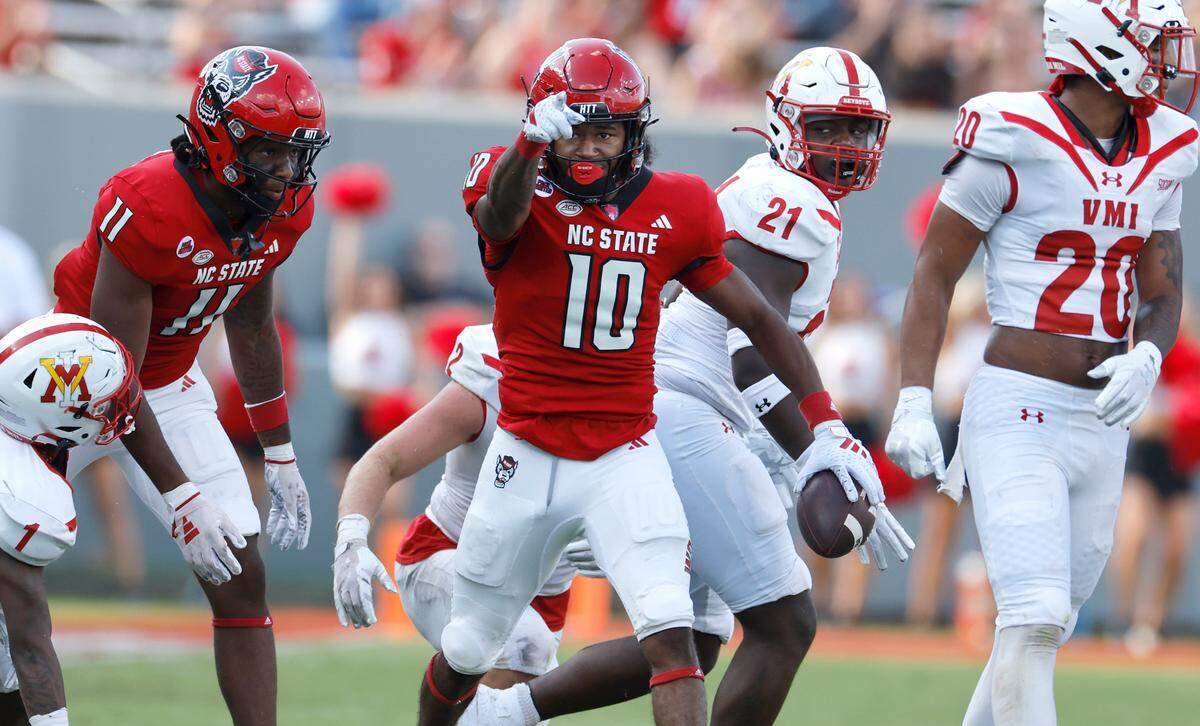 N.C. State wide receiver Kevin ‘KC’ Concepcion (10) celebrates making a first down on a reception during the second half of the Wolfpack’s 45-7 victory over VMI at Carter-Finley Stadium in Raleigh, N.C., Saturday, Sept. 16, 2023.