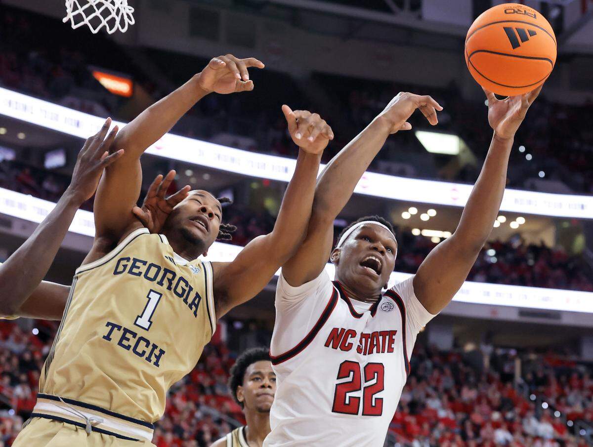 N.C. State’s Ven-Allen Lubin battles Georgia Tech’s Lamar Washington for a rebound during the second half of the Wolfpack’s 78-74 loss on Saturday, Jan. 17, 2026, at Lenovo Center in Raleigh, N.C. 