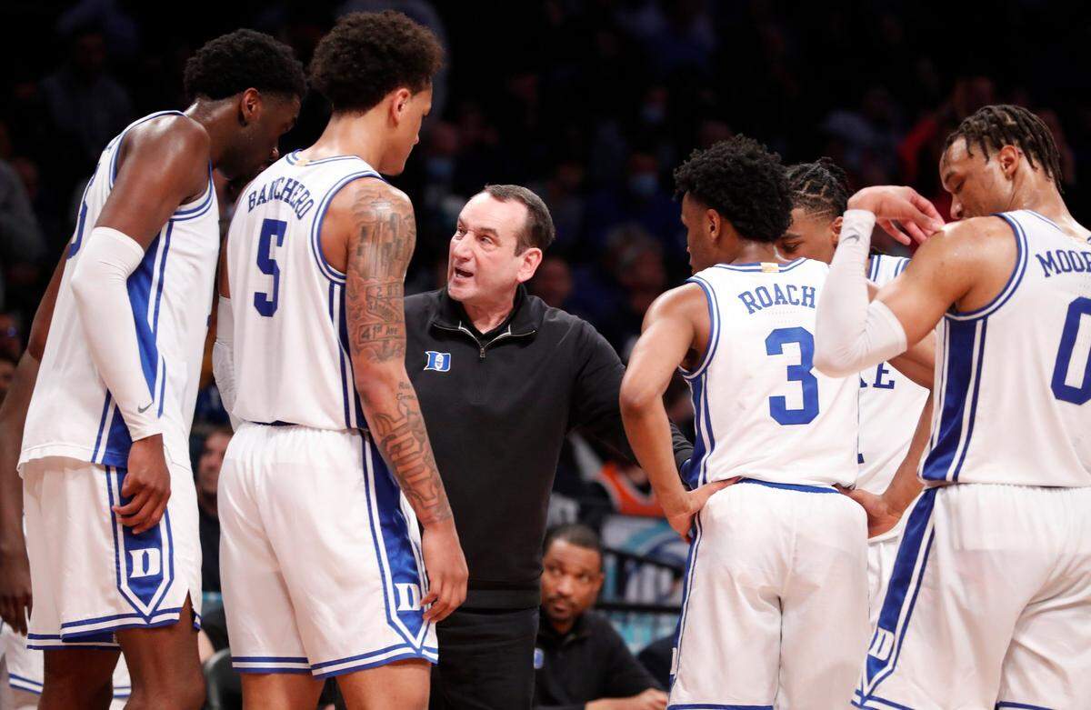 Duke head coach Mike Krzyzewski talks with his team during the second half of Dukes 88-79 victory over Syracuse in the quarterfinals of the ACC mens basketball tournament at the Barclays Center in Brooklyn, N.Y., Thursday, March 10, 2022.