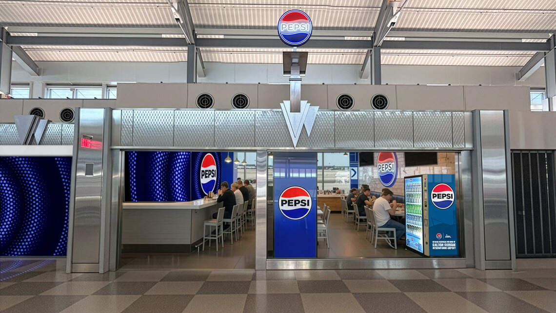RDU airport lacks free places to sit at a table. This new lounge will help.