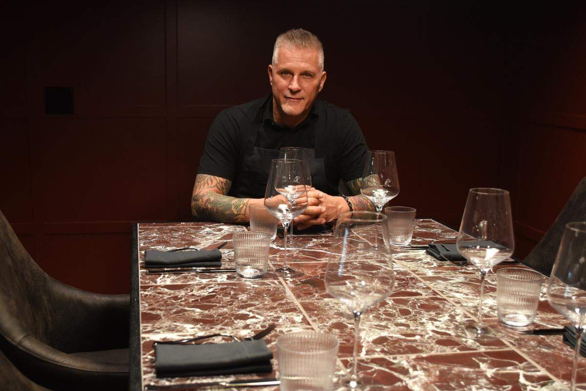 At the new Crawford Brothers Steakhouse in Cary, one six seat private dining room sits just behind the dry-aging fridge. With red tiles on the floor and table and its exclusivity, chef Scott Crawford refers to the spot as the “Gangster Room.”