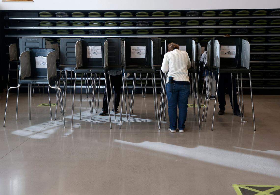 People vote at the Durham County Main Library on Tuesday, Nov. 8, 2022, in Durham, N.C.