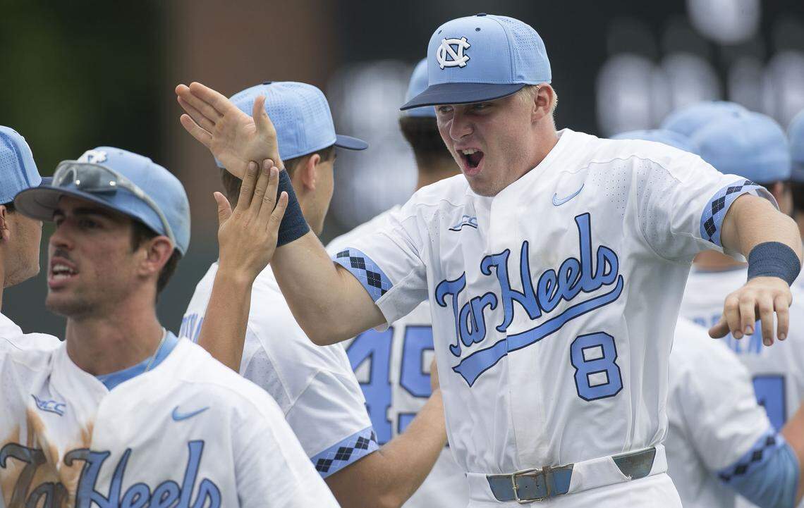 North Caroline short stop Ike Freeman (8) celebrates with his teammates after the Tar Heels rolled to an 11-2 victory over Virginia Tech on Friday, May 18, 2018 at Boshamer Stadium in Chapel Hill, N.C.