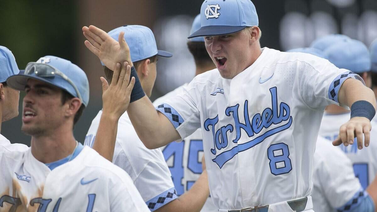 North Caroline short stop Ike Freeman (8) celebrates with his teammates after the Tar Heels rolled to an 11-2 victory over Virginia Tech on Friday, May 18, 2018 at Boshamer Stadium in Chapel Hill, N.C.