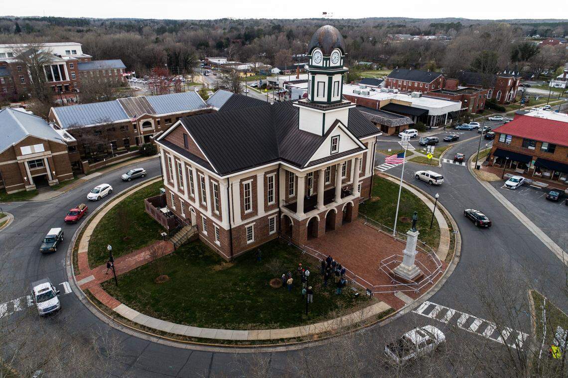 A Confederate monument stands Monday afternoon, March 18, 2019 at the Chatham County Courthouse in Pittsboro. About 30 supporters of the monument gathered around the courthouse traffic circle ahead of a county commission meeting where residents voiced opinions for an against the removal of the monument.