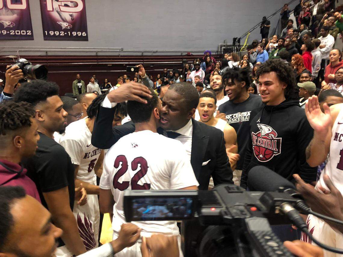 N.C. Central coach LeVelle Moton hugs guard C.J. Keyser after the Eagles won the MEAC regular-season championship with an 86-80 win over North Carolina A&T in March.