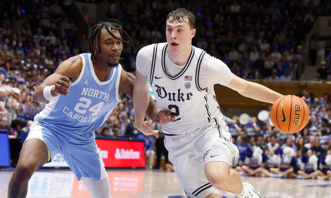 Duke’s Cooper Flagg (2) drives past North Carolina’s Jae’Lyn Withers (24) during the second half of Duke’s 87-70 victory over UNC at Cameron Indoor Stadium in Durham, N.C., Saturday, Feb. 1, 2025.