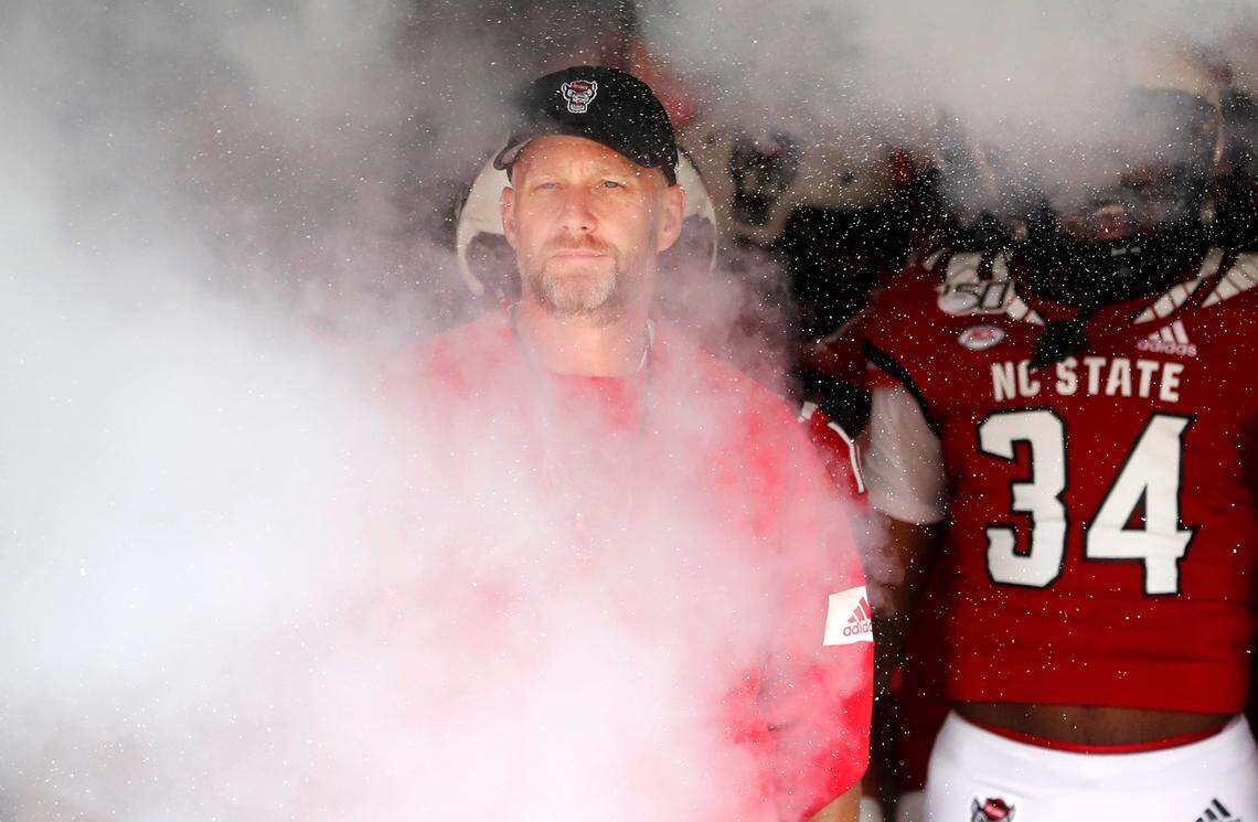 N.C. State head coach Dave Doeren prepares to head onto the field before N.C. State football’s spring game at Carter-Finley Stadium in Raleigh, N.C., Saturday, April 9, 2022.