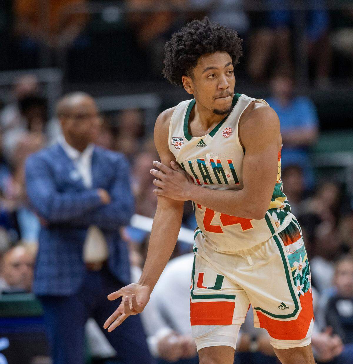 Miami’s Nijel Pack (24) reacts after sinking a three-point basket in the first half against North Carolina on Saturday, February 10, 2024 at the Watsco Center in Coral Gables, Florida.