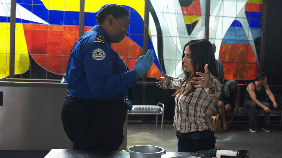 BETTER THINGS “Chicago” Episode 1 (Airs Thursday, February 28 10:00 pm/ep) -- Pictured: (l-r) Liz Jenkins as TSA Agent, Pamela Adlon as Sam Fox. CR: Suzanne Tenner/FX