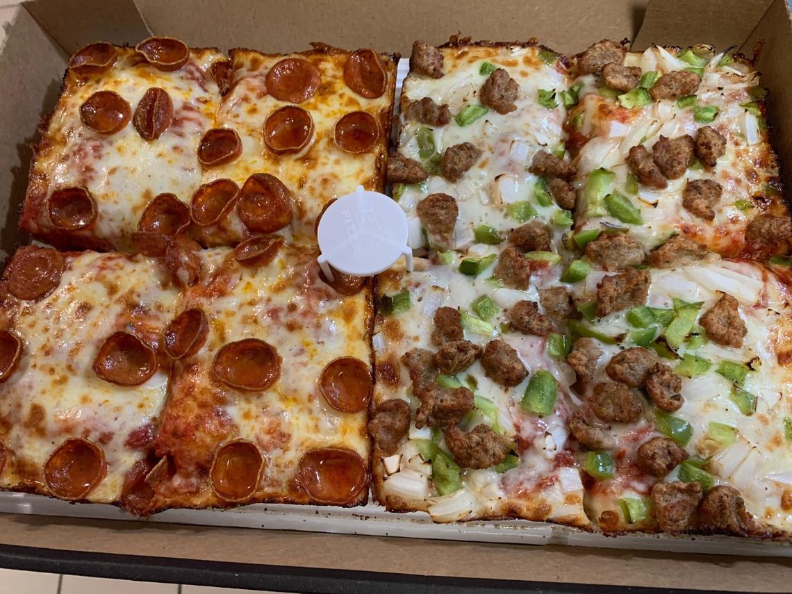 Detroit-style pizza is the name of the game at Jet’s, the Michigan-based chain with three Triangle locations. The trademark thick crust, baked in square steel pans to a light, airy, crisp-cornered turn, will silence all but the harshest critic.