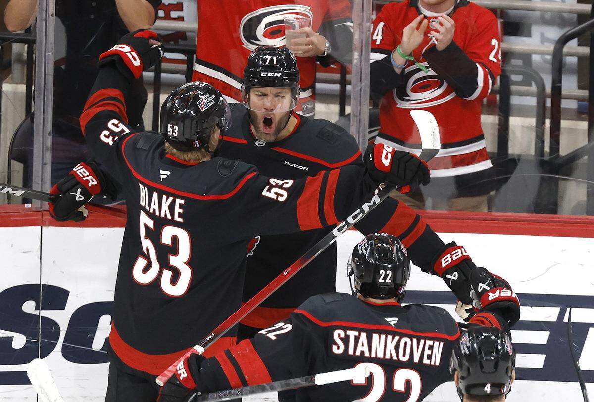 Carolina's Jackson Blake (53) celebrates with Taylor Hall (71) after Hall scored during the first period of the Hurricanes’ game against the Canadiens in game five of the Eastern Conference Finals at the Lenovo Center Friday, May 29, 2026.