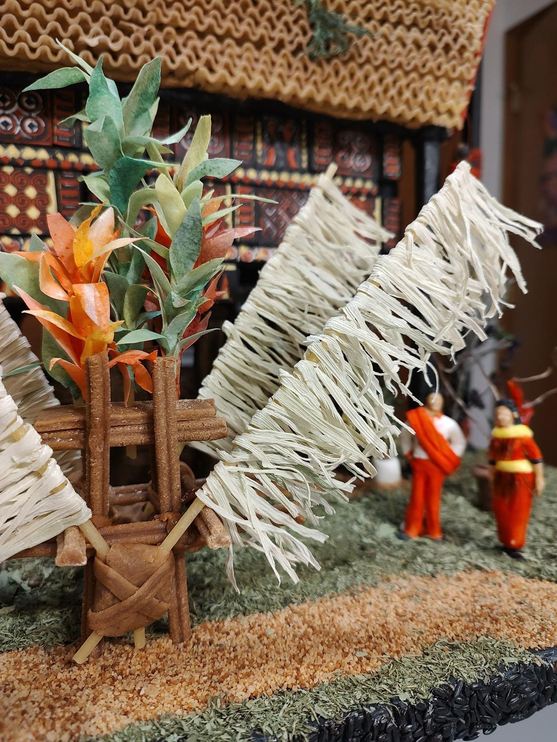 The roof of “Christmas at the Tongkonan” was made of pasta, which Faith An and Deborah Kinton both agreed was a particularly frustrating ingredient.