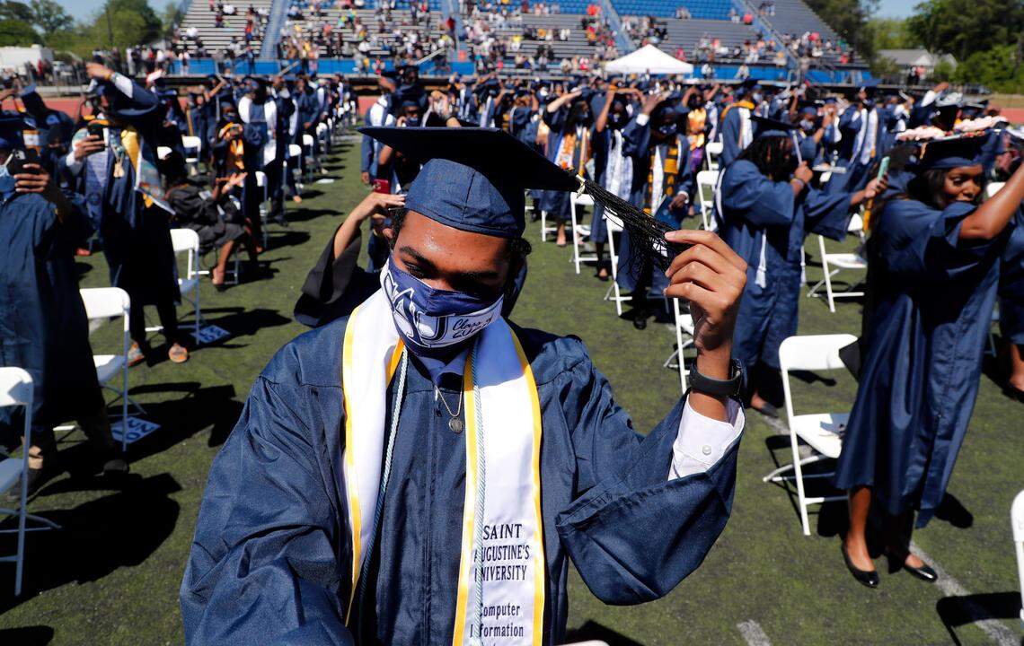 Class of 2020 graduate Alcion Thompson turns his tassel during commencement exercises for the Classes of 2020 and 2021 at St. Augustine’s University in Raleigh, N.C., Saturday, May 1, 2021.
