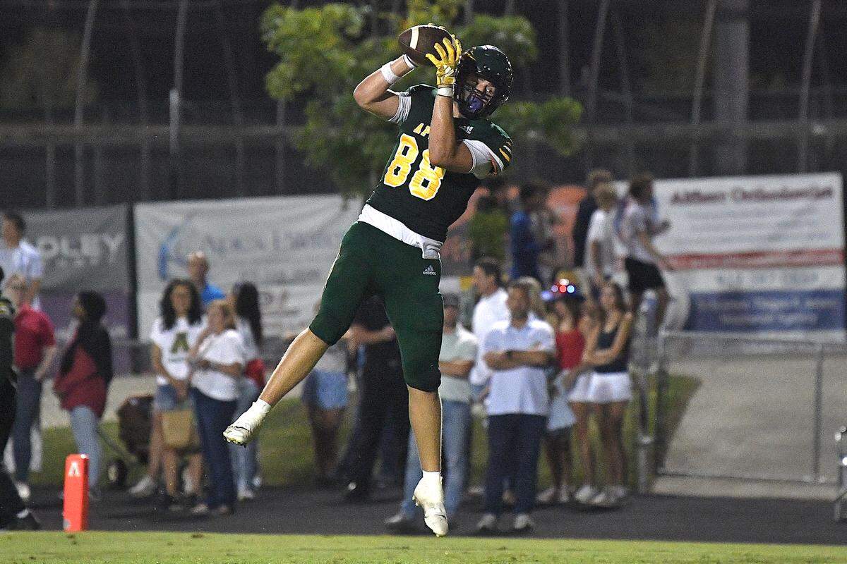 Apex tight end Kaleb Morrow (88) makes the catch for the two-point conversion against Panther Creek late in the first half. The Apex Cougars and the Panther Creek Catamounts met in a conference football game in Apex, N.C. on September 20, 2024.
