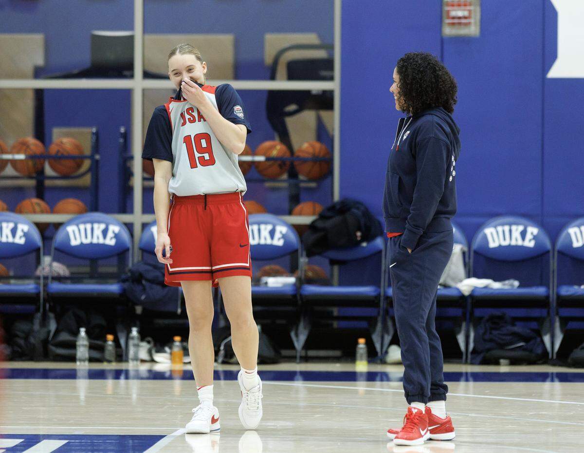 Paige Bueckers and head coach Kara Lawson share a laugh during USA Basketball Women’s National Team training camp on Friday, Dec. 12, 2025, in Durham, N.C.