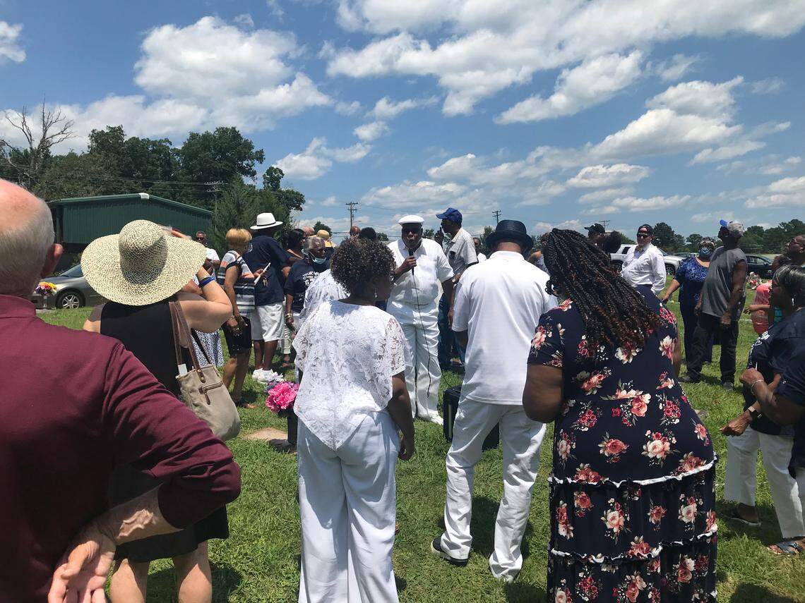 Ernest Bason, Jr., a cousin of Thorpe’s, sings a hymn during the memorial for her at Beechwood Cemetery in Durham on Sunday, July 4, 2021.