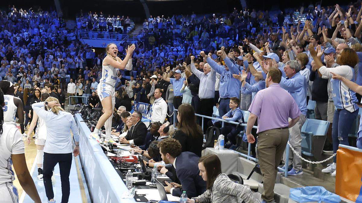 North Carolina’s Alyssa Ustby (1) celebrates with fans after UNC’s 58-47 victory over West Virginia in the second round of the NCAA women’s basketball tournament at Carmichael Arena in Chapel Hill, N.C., Monday, March 24, 2025.