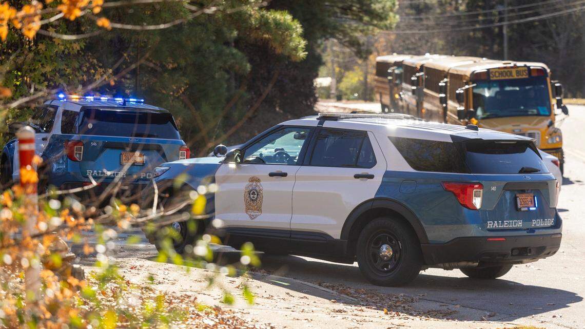 Police block an entrance at Southeast Raleigh High School during a Code Red lockdown Monday, Nov. 27, 2023. The school is on lockdown after a person was stabbed on campus.
