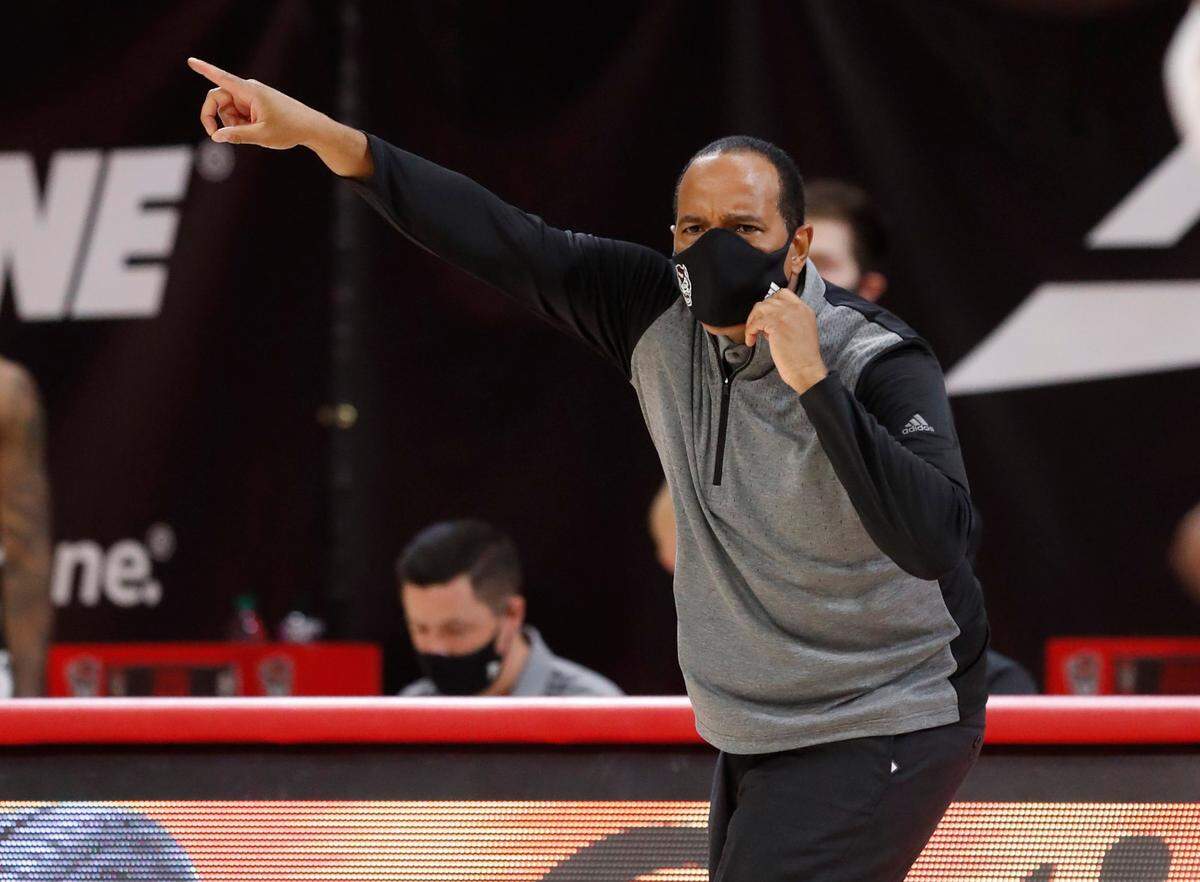 N.C. State’s head coach Kevin Keatts yells to his team during the first half of N.C. State’s game against North Florida in the Mako Medical Wolfpack Invitational at Reynolds Coliseum in Raleigh, N.C., Friday, Nov. 27, 2020.