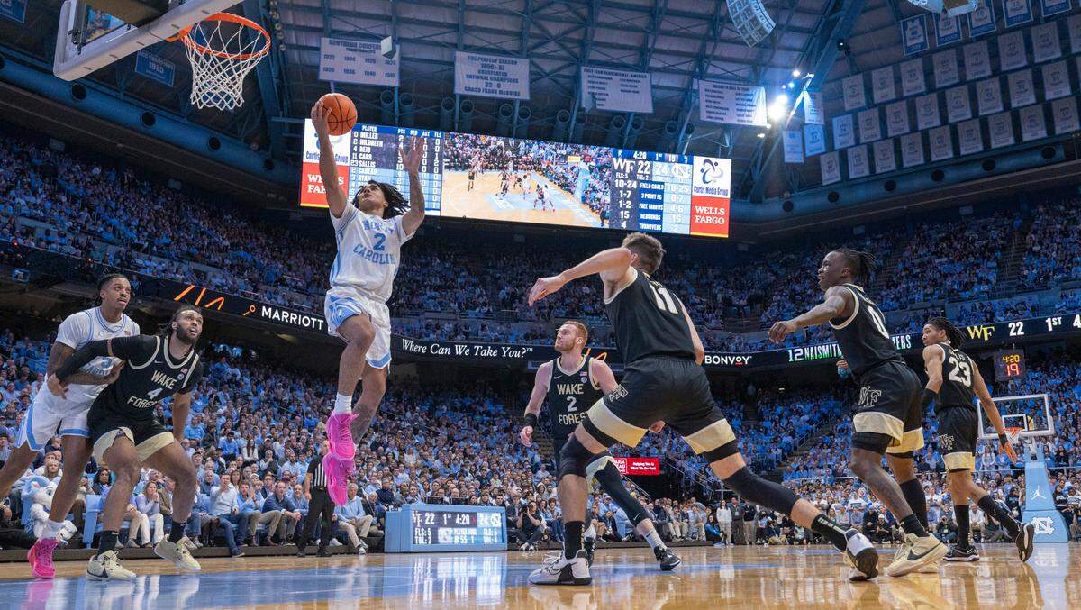 North Carolina’s Elliot Cadeau (2) breaks to the basket on a fast break in the first half against Wake Forest on Monday, January 22, 2024 at the Smith Center in Chapel Hill, N.C. Cadeau scored 14 points in the Tar Heels’ victory