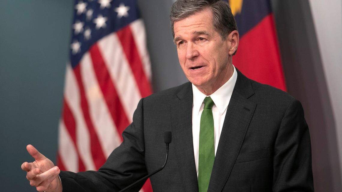 North Carolina Governor Roy Cooper urges those not yet vaccinated to participate in the new cash drawing incentive and college scholarships programs to boost COVID-19 vaccination rates, during a press briefing on Thursday, June 10, 2021 at the Emergency Operations Center in Raleigh, N.C.