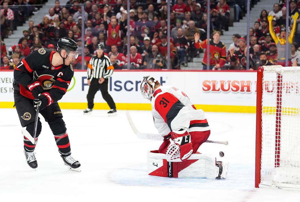 Carolina Hurricanes goalie Frederik Andersen makes a save against Brady Tkachuk of the Ottawa Senators during the second period in Game 3 of the first round of the 2026 Stanley Cup playoffs at Canadian Tire Centre on April 23, 2026, in Ottawa, Canada.