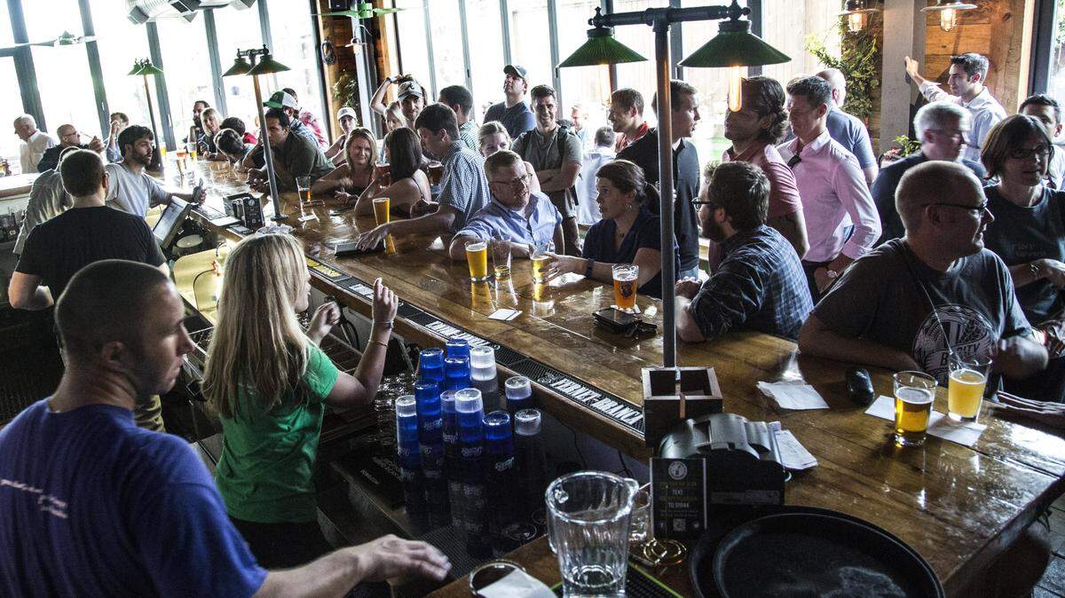 Niall Hanley, owner of The Raleigh Beer Garden, shown here, and several other restaurants in Raleigh, says he needs to fill a variety of jobs, including servers, hosts, bartenders and line cooks, at the Wake County job fair.