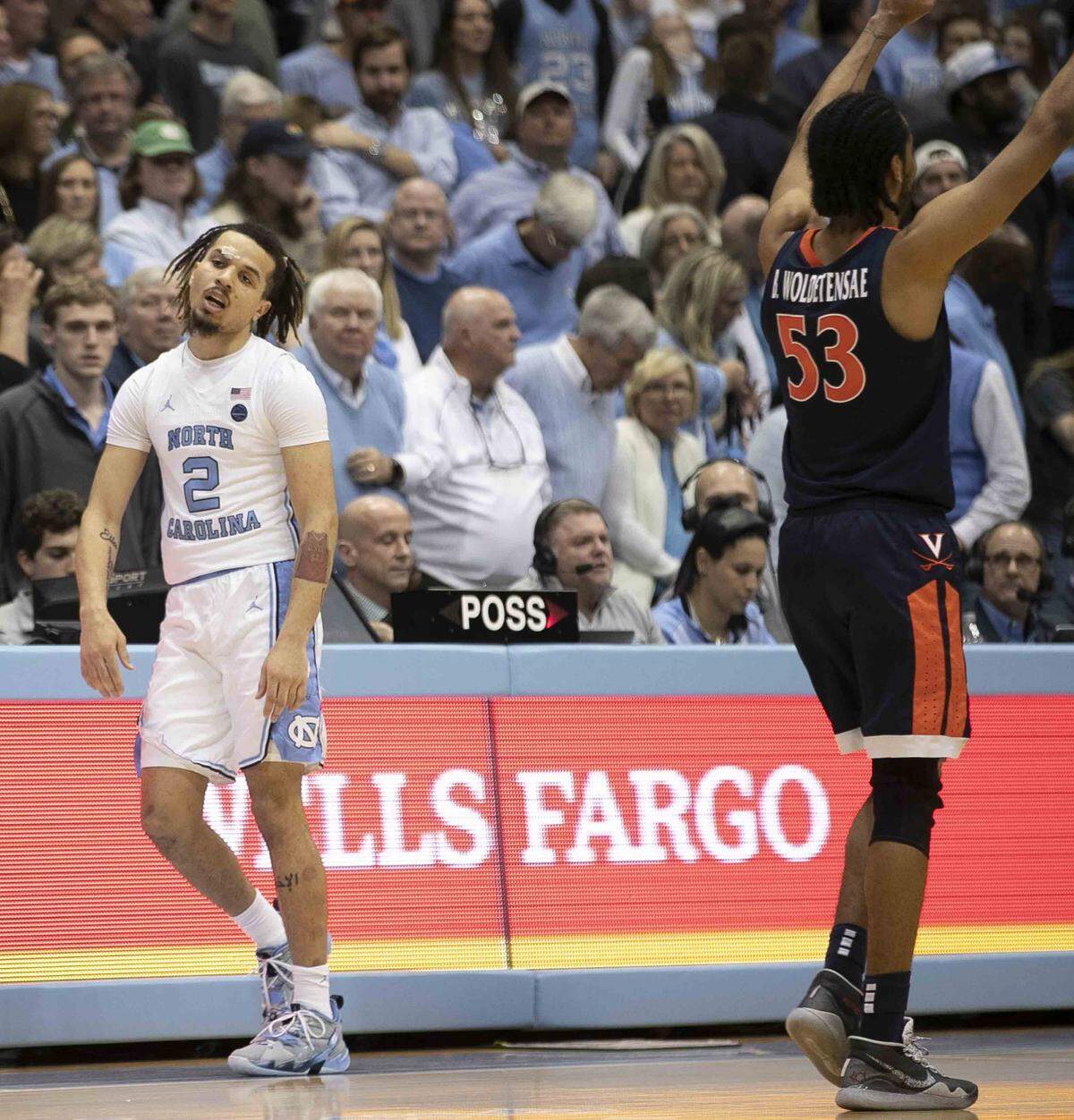 North Carolina’s Cole Anthony (2) reacts as time expires while Virginia celebrates their 64-62 victory on Saturday, February 15, 2020 at the Smith Center in Chapel Hill, N.C.