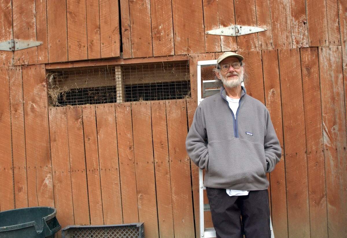 Duke University biolog professor Peter Klopfer outside of one of his animal barns on family land in Orange County in this 2003 file photo.