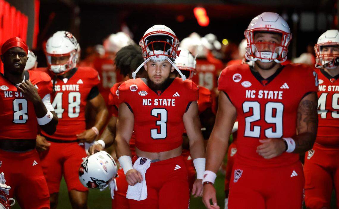 N.C. State running back Jordan Houston (3) and teammates head out onto the field to warmup before the Wolfpack’s game against Notre Dame at Carter-Finley Stadium in Raleigh, N.C., Saturday, Sept. 9, 2023.