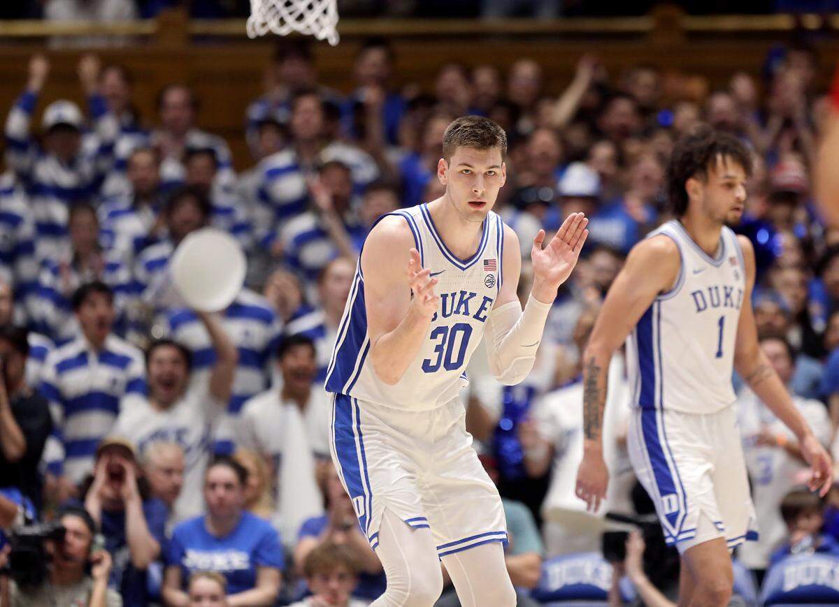Duke’s Kyle Filipowski encourages the crowd during the second half of Duke’s 71-67 win over N.C. State on Tuesday, Feb. 28, 2023, at Cameron Indoor Stadium in Durham, N.C.
