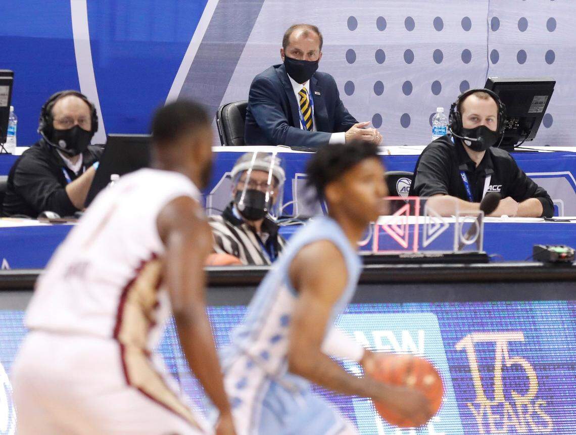 ACC commissioner Jim Phillips watches during the first half of UNCs game against Florida State in the semifinals of the ACC Mens Basketball Tournament in Greensboro, N.C., Friday, March 12, 2021.