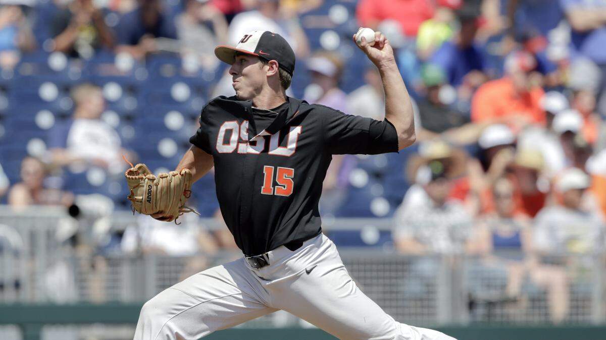 Luke Heimlich pitches in the College World Series for Oregon State.