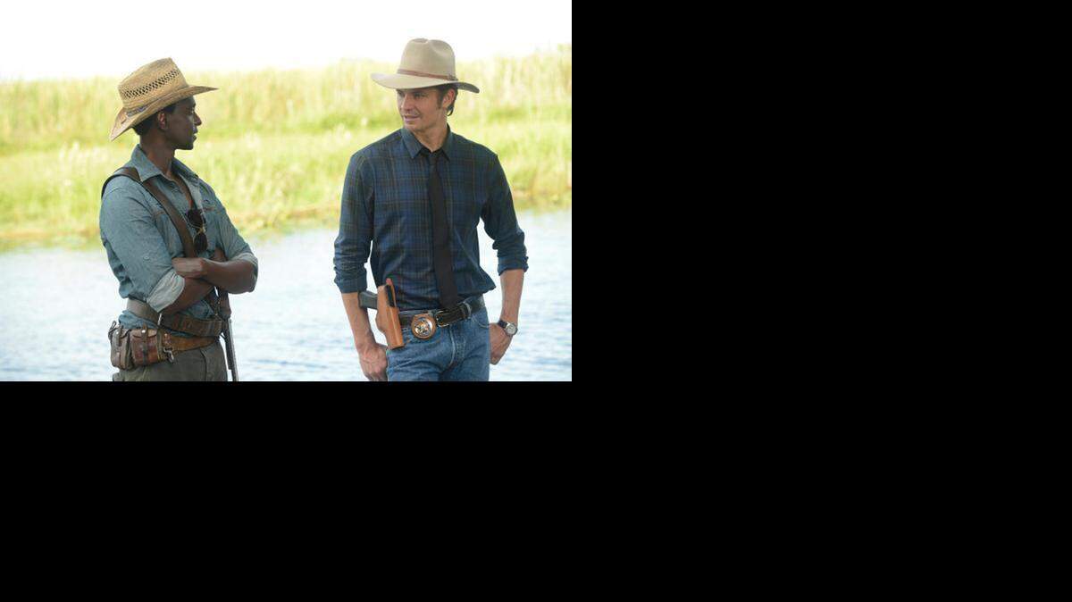 
From the season premiere of “Justified,” Edi Gathegi as Jean Baptiste and Timothy Olyphant as Deputy U.S. Marshal Raylan Givens.