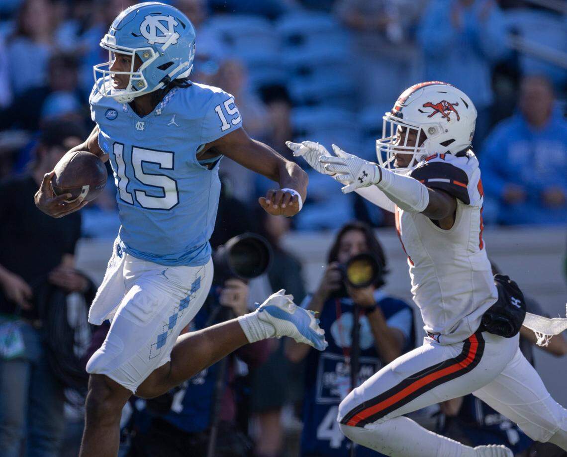 North Carolina quarterback Conner Harrell (15) scores on a 61-yard run in the fourth quarter to give the Tar Heels’ a 52-7 lead against Campbell on Saturday, November 4. 2023 at Kenan Stadium in Chapel Hill, N.C.