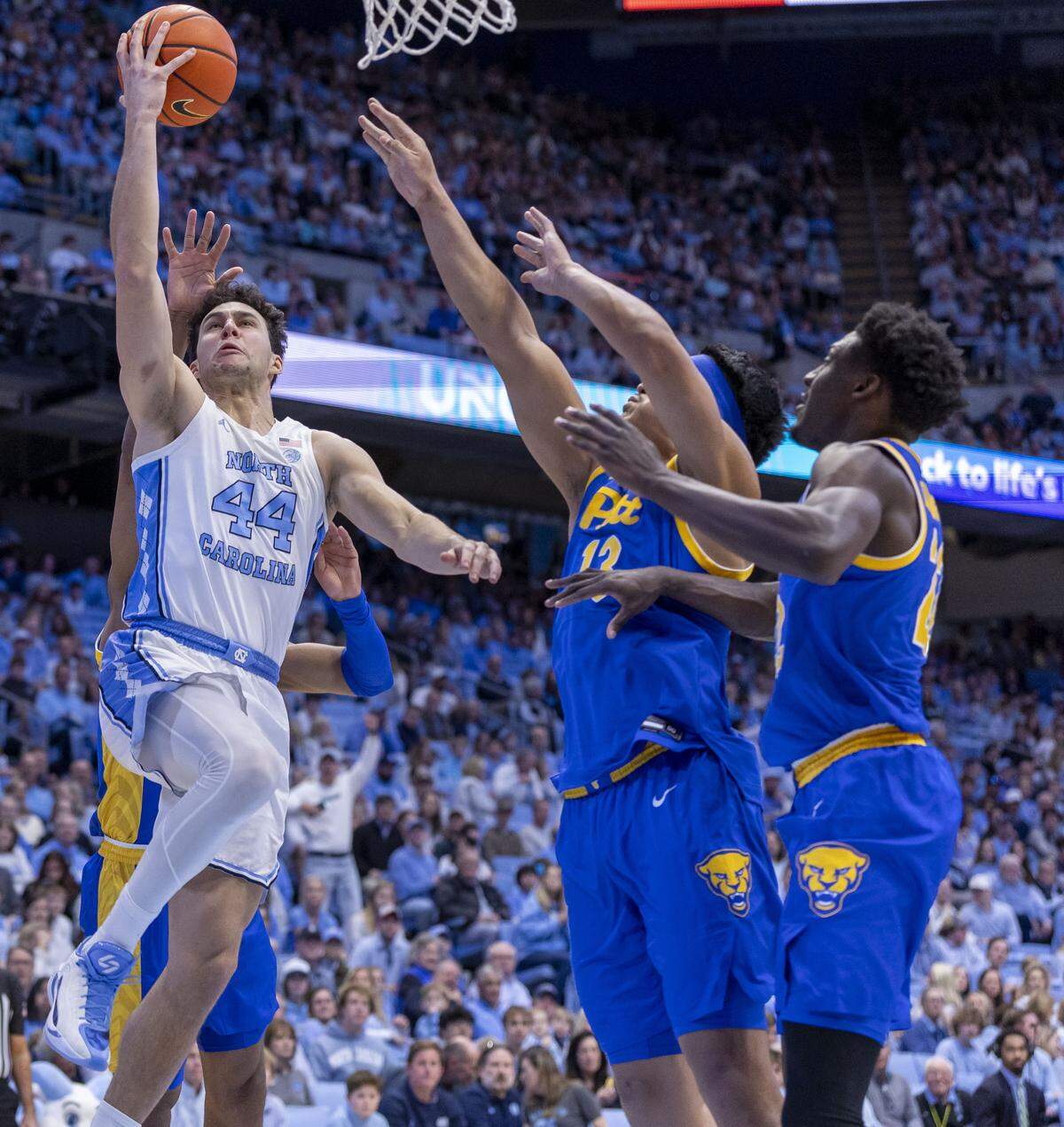 North Carolina guard Luka Bogavac (44) drives to the basket against Pitt forward Roman Siulepa (13) in the first half on Saturday, February 14, 2026 at the Smith Center in Chapel Hill, N.C.