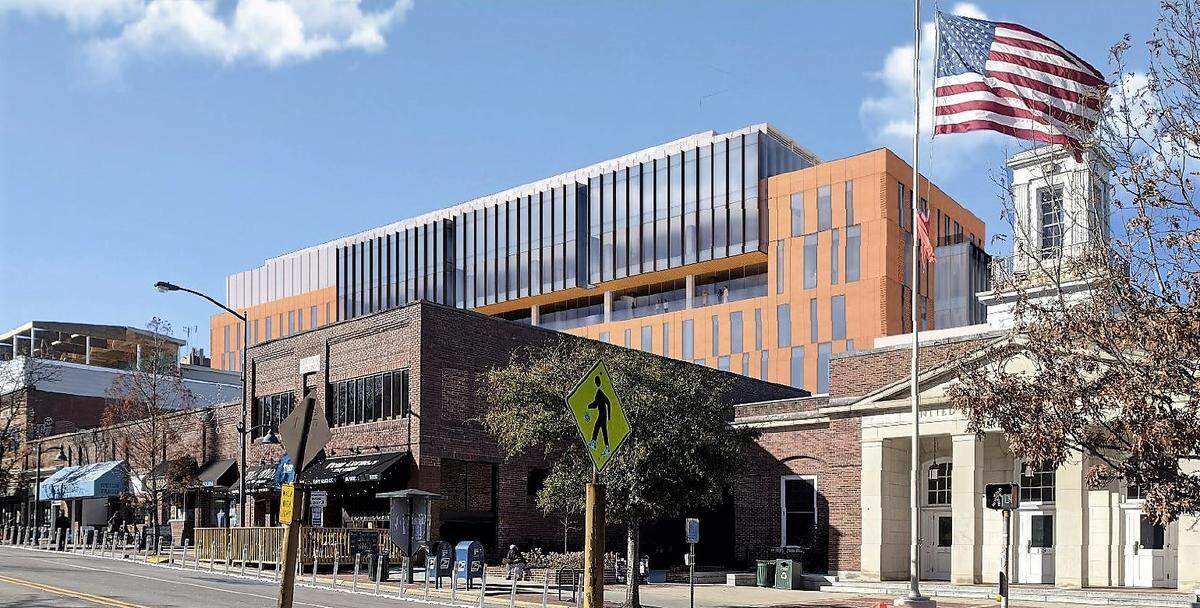 An architect’s rendering shows how the seven-story 150 East Rosemary building could look from the corner of East Franklin and Henderson streets at the Chapel Hill Post Office.