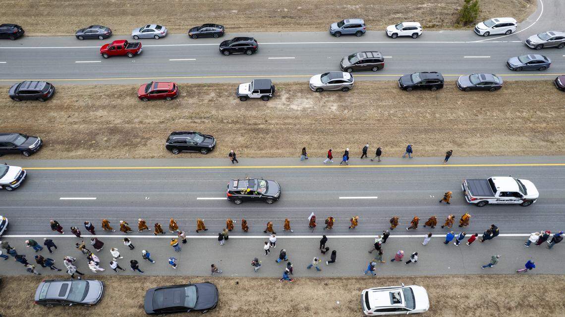 Hundreds flock to Jordan Lake to share in monks’ message of peace, detachment