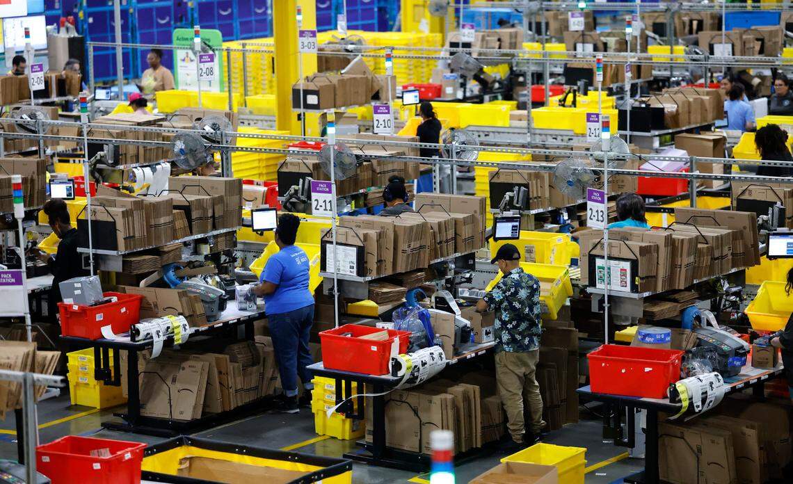 Inside Amazon’s RDU1 warehouse in Garner, employees and robots unload, stow, pick, pack, prepare and ship orders. 