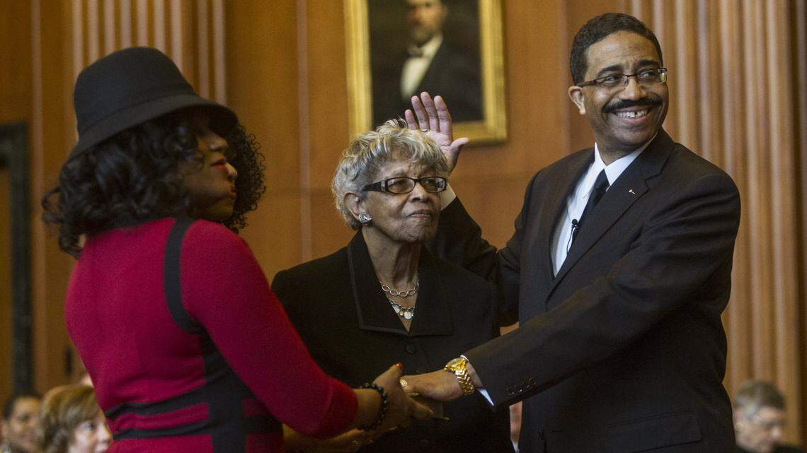 Supreme Court of North Carolina associate justice Mike Morgan takes the oath as his wife Audrey Morgan, left, and his mother Barbara Morgan look on Jan. 4, 2017. Morgan's election created a 4-3 Democratic majority on the state's high court. that will last until at least 2022.